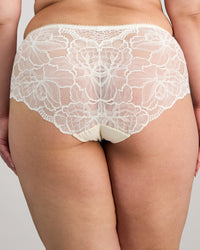 Model wears Midnight Express Full Brief in EGRET. On body back view