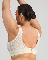 Model wears Midnight Express Wire Free Bra in EGRET. On body side view