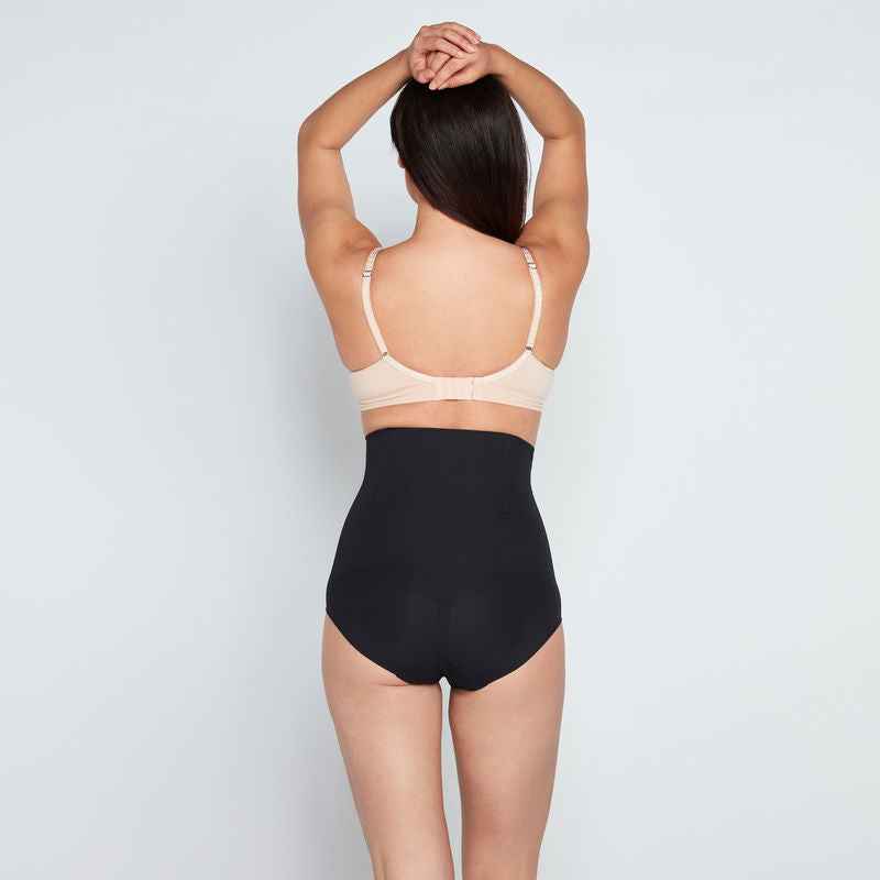 Model wears Medium Control High Waisted Brief in BLACK. On body back view