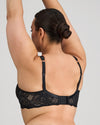 Model wears Midnight Express Underwire Bra in BLACK. On body side view