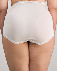 Model wears Nylon Tricot Full Brief in WHITE. On body back view