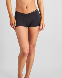 Model wears Simply Seamless Boyshort in BLACK. On body front view