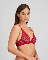 Model wears Morning Lola Underwire Bra in JESTER RED. On body side view
