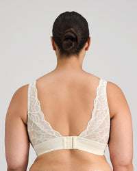 Model wears Midnight Express Wire Free Bra in EGRET. On body back view