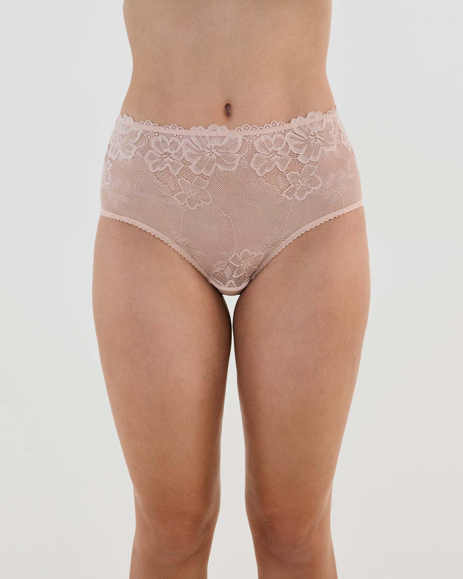 Model wears All Lacey Full Brief in LATTE. On body front view
