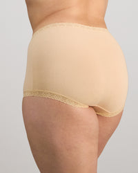 Model wears Bendon Cotton Full Brief in NATURELLE. On body side view