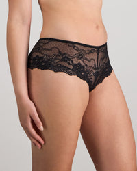 Model wears My Fit Lace Brazilian in BLACK. On body side view