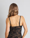 Model wears My Fit Lace Chemise in BLACK. On body back view