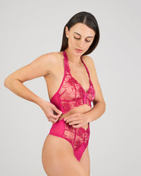 Heritage Bloom Bodysuit in FANTASY FUCHSIA. Flat lay back view
