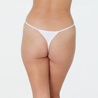 Model wears Clemence Thong in WHITE. On body back view