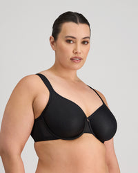 Model wears Perfect Lines Contour Bra in BLACK. On body side view