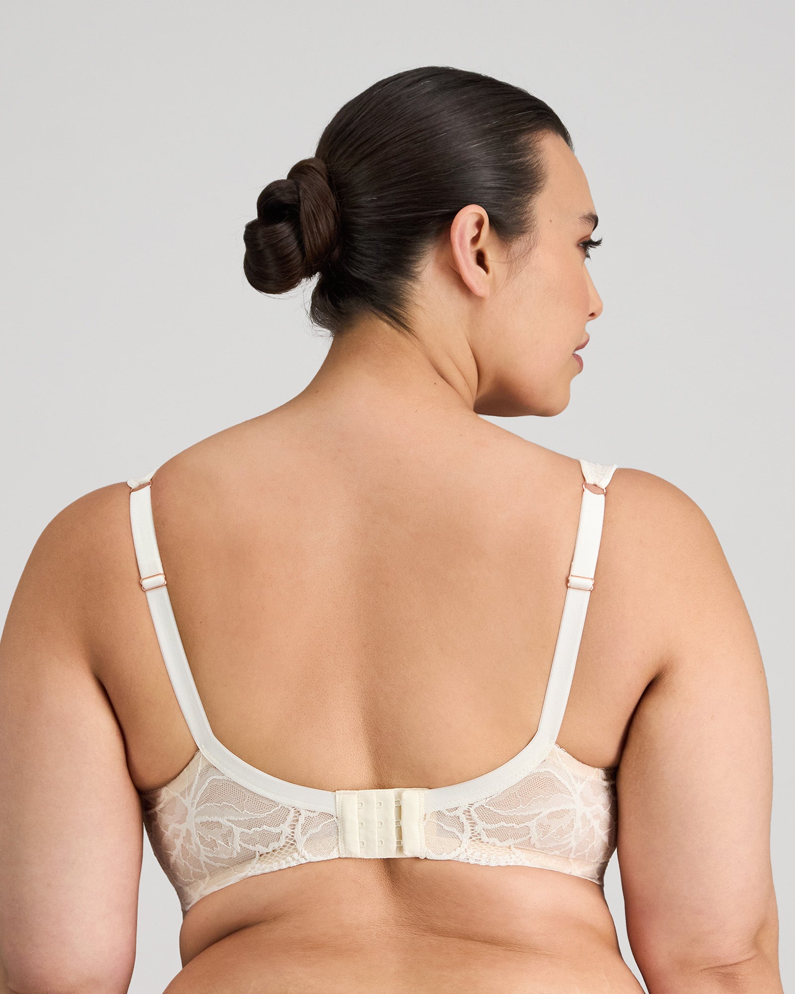 Model wears Midnight Express Underwire Bra in EGRET. On body back view