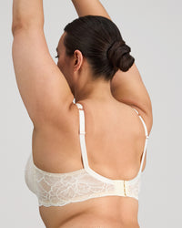 Model wears Midnight Express Underwire Bra in EGRET. On body side view