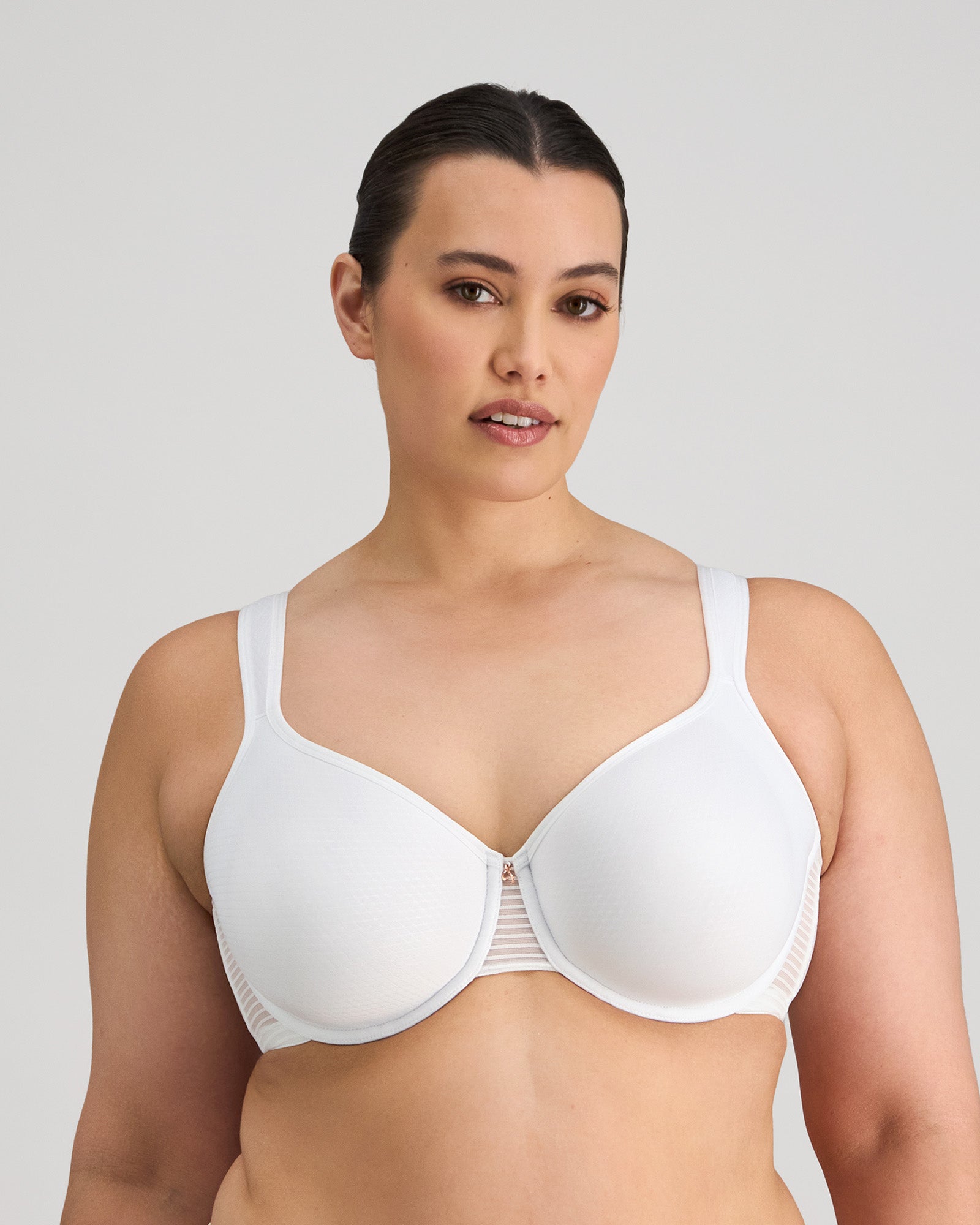 Model wears Perfect Lines Contour Bra in WHITE. On body front view