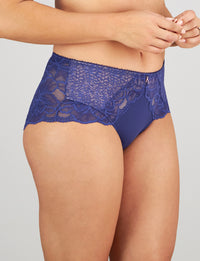 Model wears Midnight Express Full Brief in BLUE RIBBON. On body side view