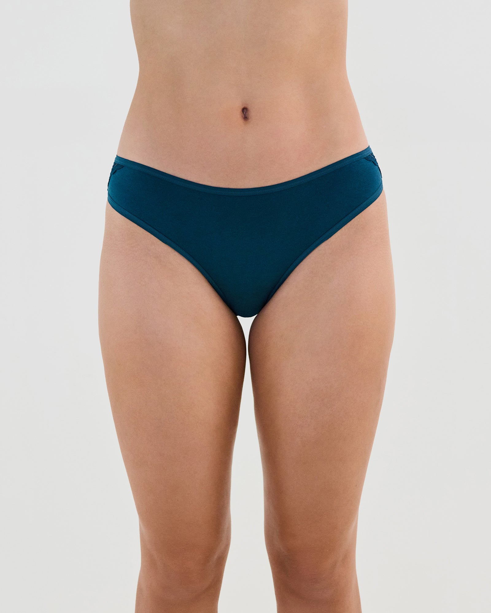 Model wears Cotton And Lace Bikini in REFLECTING POND. On body front view