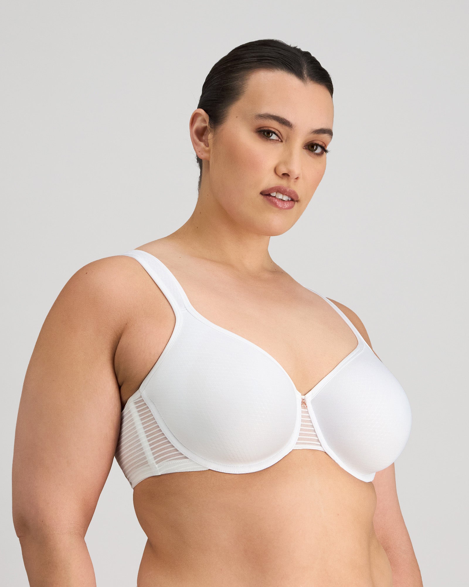 Model wears Perfect Lines Contour Bra in WHITE. On body side view