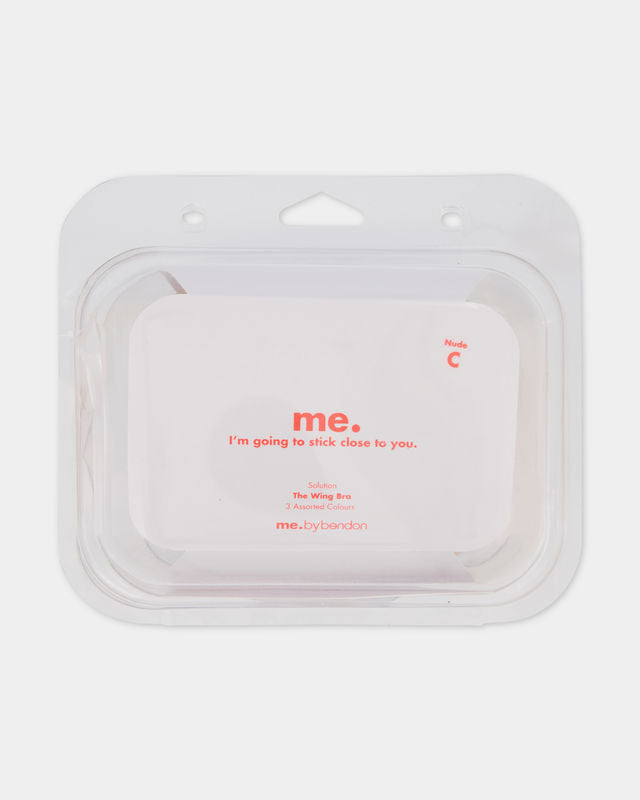 Model wears The Wing Bra Strap + Back Less Bras in Nude. On body front view