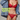 Person wearing red lingerie with a denim jacket, text 'SHOP SETS' in green.