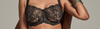 Hero banner Black lace bra worn by a person on a neutral background