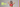 Woman wearing a red bra with 'bendon Bra Better Rewards' text on a gray background