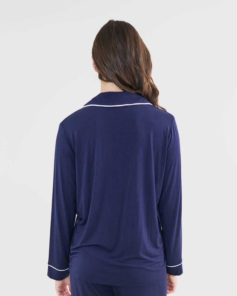 Model wears Bamboo Bliss Long Sleeve PJ Top in NAVY BLAZER. On body back view