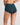 Model wears Body Cotton Full Brief in PONDEROSA PINE. On body back view