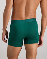 Model wears Bamboo Mens Trunk in RAIN FOREST. On body back view