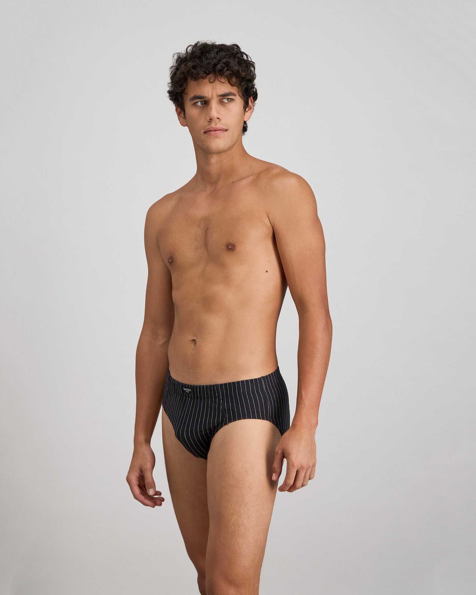 Cotton Stretch Mens Brief in BLACK PINSTRIPE. Flat lay back view