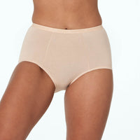 Model wears Body Cotton Full Brief in NATURAL. On body front view
