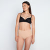 Model wears Medium Control Full Brief in CARAMEL. On body front view