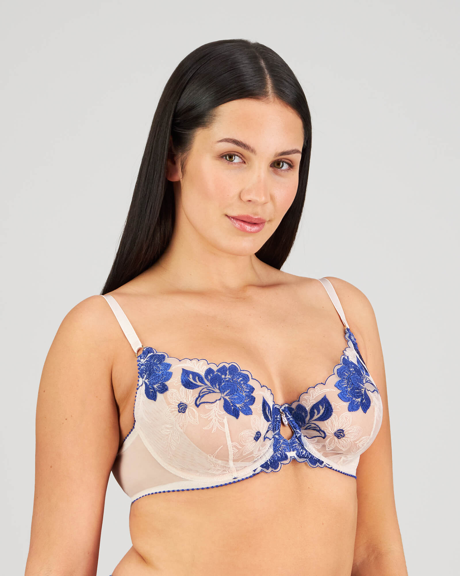 Model wears Everleigh Underwire Bra in SURF THE WEB/BLUSH. On body side view