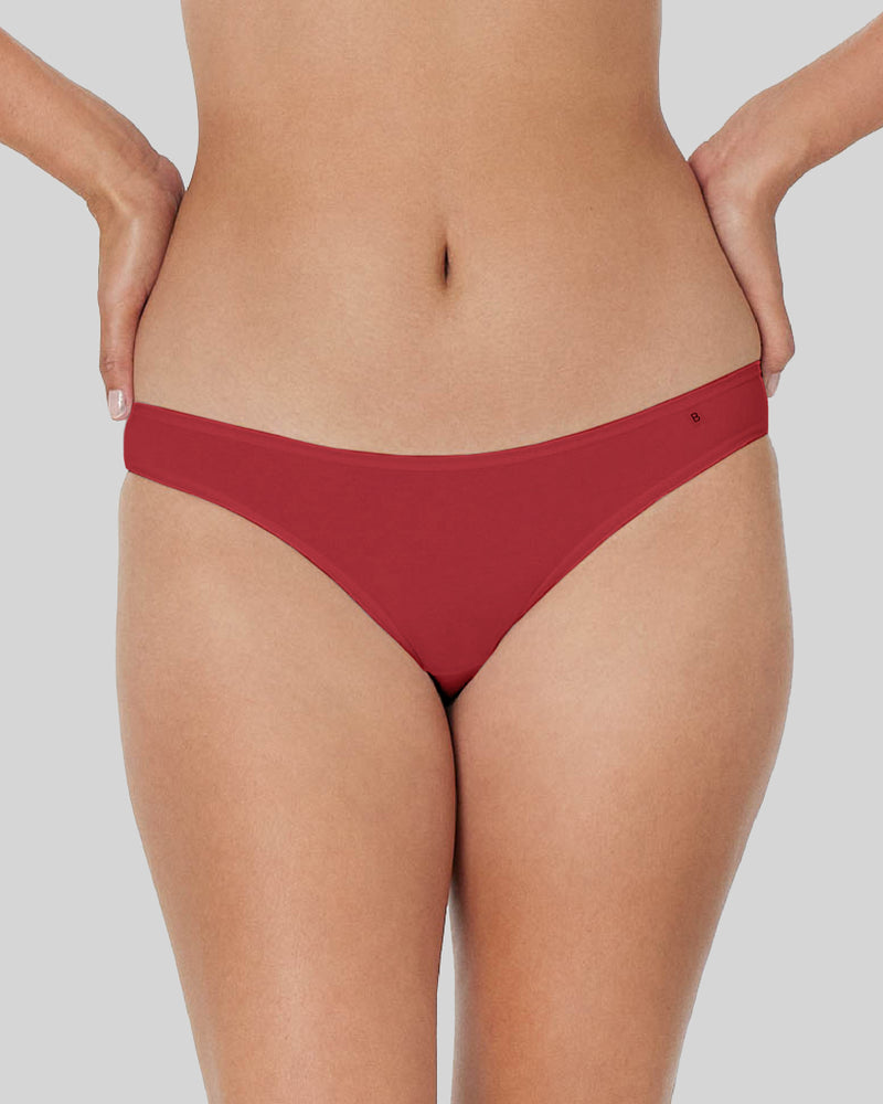Model wears Clemence Bikini in JESTER RED. On body front view