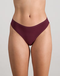 Model wears Extra-Ordinary Thong in FIG. On body front view