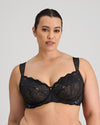Model wears Midnight Express Underwire Bra in BLACK. On body front view