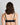 Model wears Comfit Collection Wire Free Bra in BLACK. On body back view