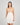 Model wears Eros Chemise in SUGAR. On body front view