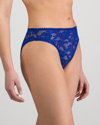 Model wears Leonie High Cut Brief in SURF THE WEB. On body side view