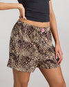 Model wears Sleigh The Night Boxer in WILD LYNX PRINT. On body side view