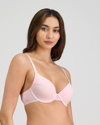 Model wears Angelica Contour Bra in PALE LILAC. On body side view
