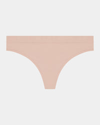 Seamless Soft Thong in LATTE. Flat lay front view
