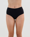 Model wears Cotton And Lace Full Brief in BLACK. On body front view