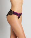 Model wears Sensuale Midi in RASPBERRY RADIANCE/BLACK. On body side view