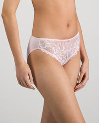 Model wears Embrace Bikini in FESTIVAL BLOOM. On body side view