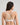 Model wears My Fit Lace Push Up Bra in WHITE. On body back view