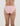 Model wears Stretch Cotton Bikini in ICY PINK. On body back view