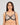 Model wears Magnetism Underwire Bra in BLACK/LATTE. On body front view