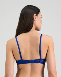 Model wears Leonie Underwire Bra in SURF THE WEB. On body back view