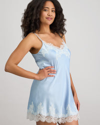 Model wears Sweet Indulgence Chemise in SKYWAY/WHITE. On body side view