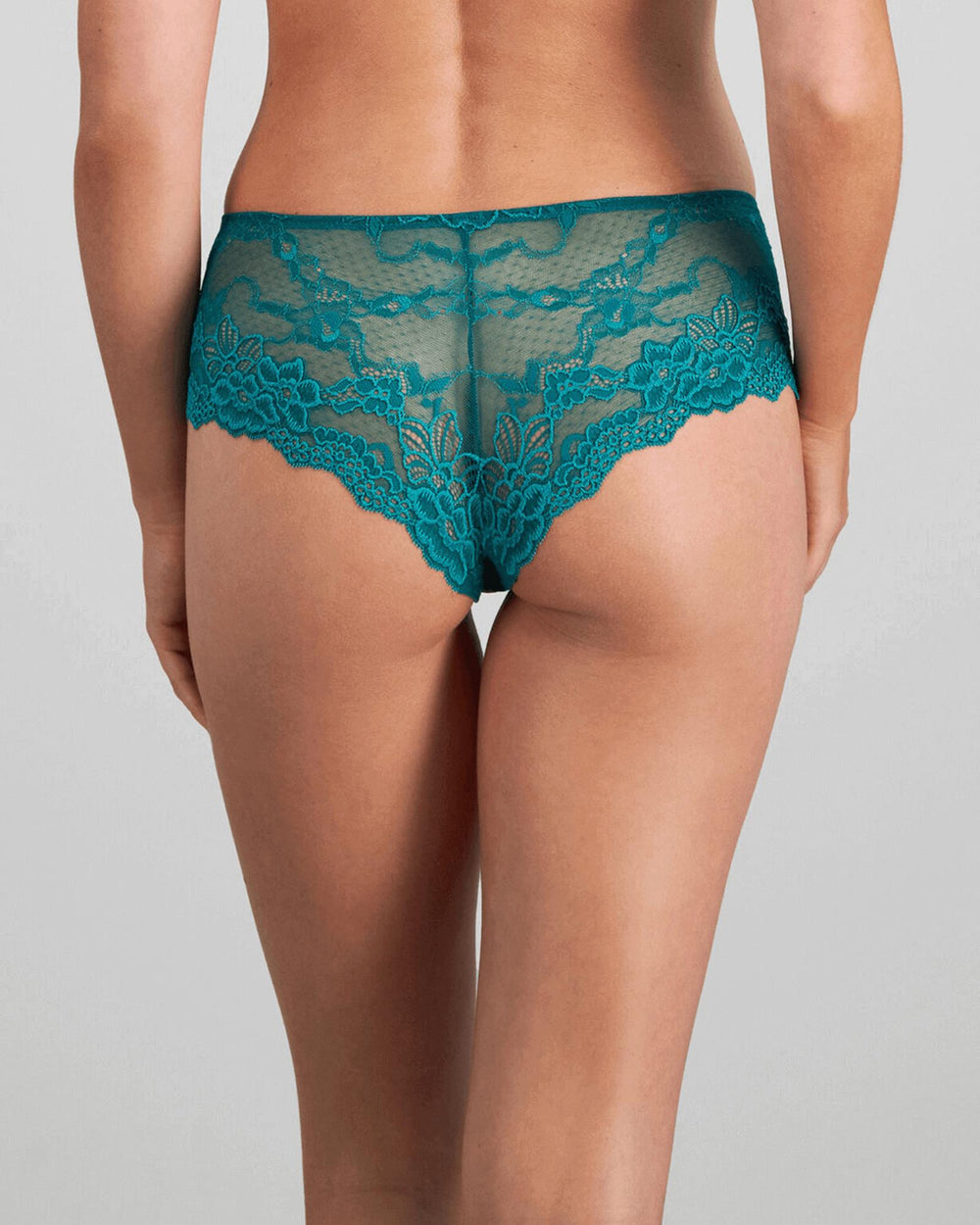 Model wears My Fit Lace Brazilian in EVERGLADE. On body back view